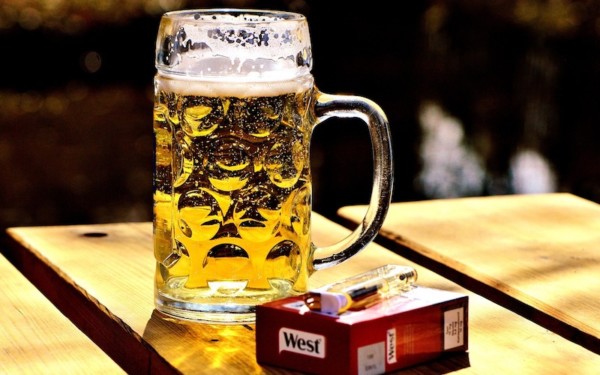Beer and Cigarettes on Table