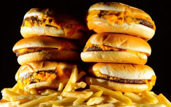Unhealthy cheeseburger and chips