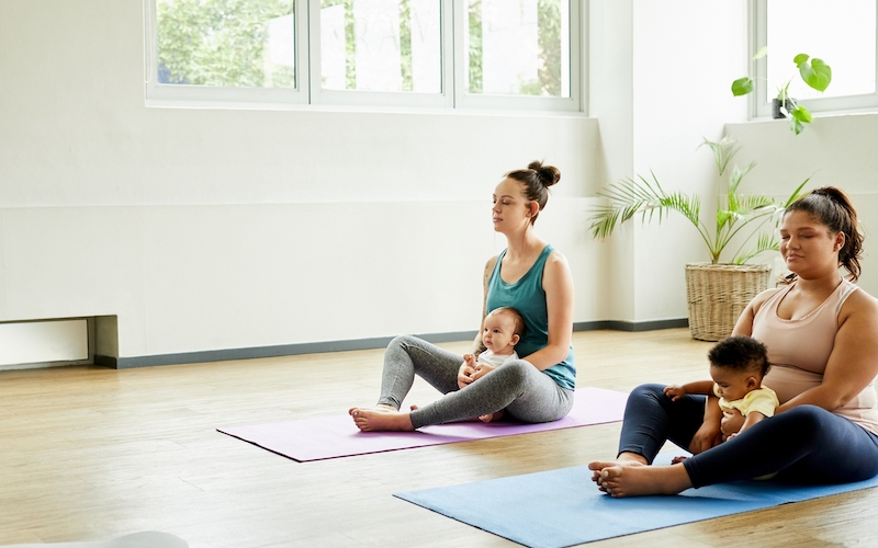 Women doing abdominal exercises postpartum