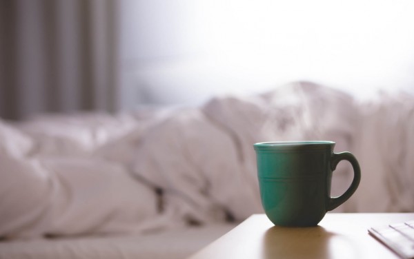 Coffee cup in bedroom
