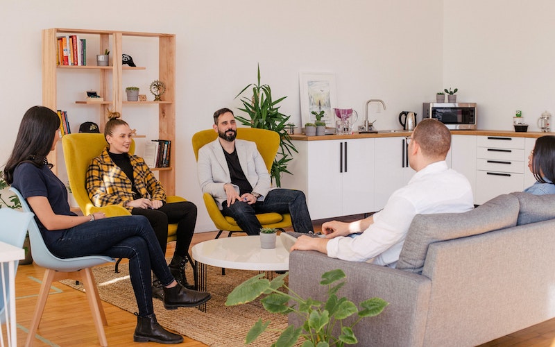 Team sitting in office tea-room